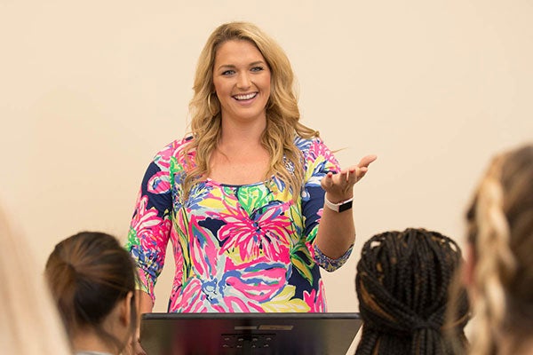 A teacher instructs class